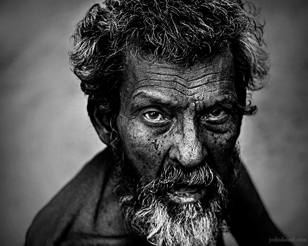 Haggard face of an old man from East Fort in Trivandrum