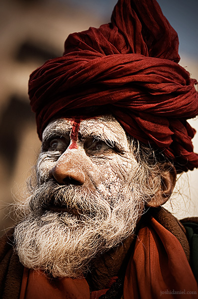 Portrait of an ash smeared sadhu in a turban from Varanasi, India