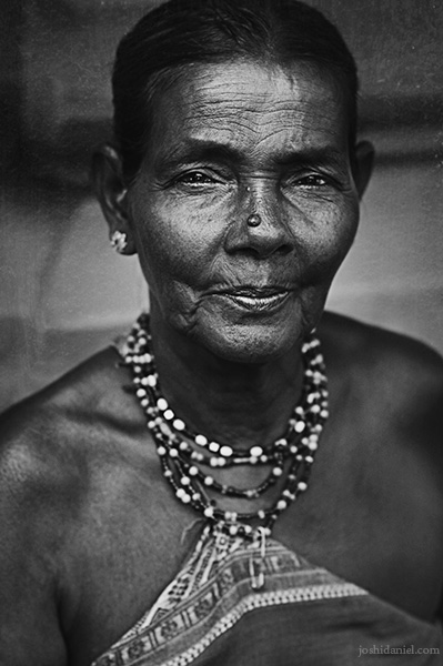 An old Halakki tribal woman in Gokarna wearing traditional jewellery