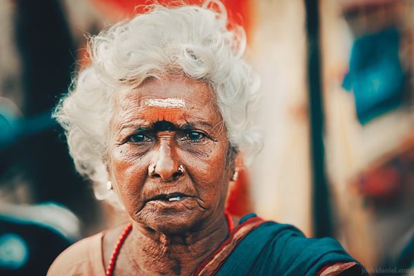 Portrait of a frowning old woman in Sowcarpet, Chennai, Tamil Nadu, India