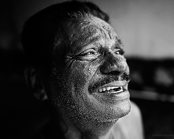 A 28mm wide angle black and white portrait of Aziz in Trivandrum, Kerala, India